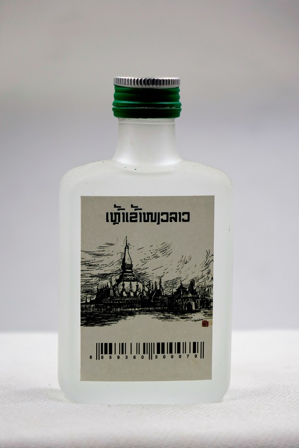 Ingredient:Glutinous rice,Mountain spring water  Preservation method:Keep airtight in a cool place  Under 18 years old,gravida,patients with elevated blood pressure and  Alcohol allergy ban drinking  Produced by BBL (Laos) Agriculture resource Co.,Ltd  Address:Saysettha Development Zone Vientiane Laos   45%vol (เหล้าข้าวเหนียวลาว)