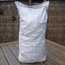 Coconut charcoal briquettes in sewing edge bags 20 kg