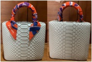 กระเป๋าถือหนังงูลิมิเต็ด พร้อมพันผ้าพันหู
รุ่น MINI SQUARE F LIMITED BELLY SOFT GREY PYTHON + EGG ORANGE TWILLY