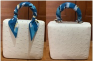 กระเป๋าถือหนังนกกระจอกเทศ พร้อมพันผ้าพันหู
รุ่น BABY SQUARE F WHITE OSTRICH + JACKY BLUE TWILLY