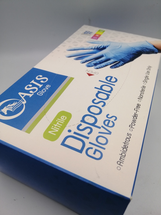 ถุงมือยางไนไตรสีฟ้าสำหรับการใช้งานทั่วไปเพื่อป้องกันการสัมผัสโดยตรงระหว่างนิ้วมือและฝ่ามือกับพื้นผิว ใช้ครั้งเดียวไม่นำกลับมาใช้ใหม่ ชนิดไม่มีแป้ง ไม่ผ่านการอบฆ่าเชื้อ ยี่ห้อโอเอซิส ขนาดกลาง (M)